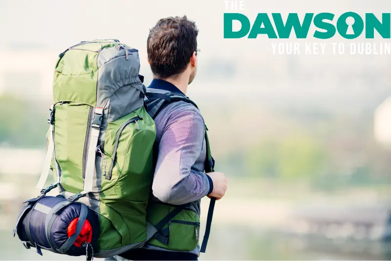Backpacker in Dublin with large rucksack near The Dawson Hostel, perfect for Backpacker hostel Dublin stays