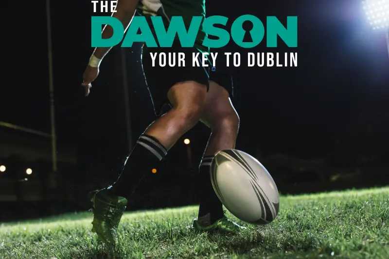 Rugby player on pitch at night with ball for Ireland Six Nations Dublin accommodation at The Dawson Hostel